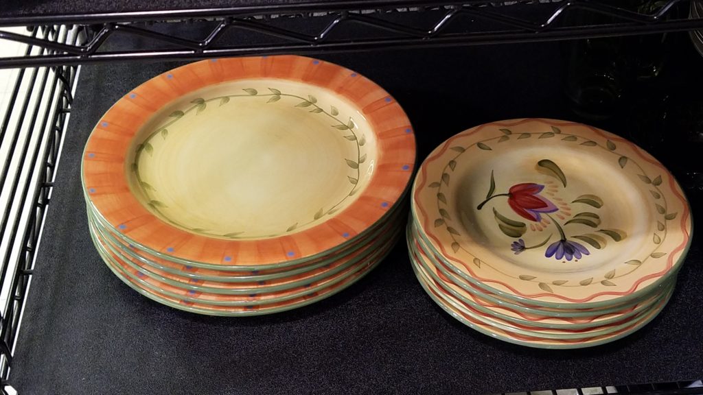 Colorful plates displayed at Ohio Valley Goodwill store