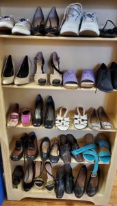 Shelf of sandals and shoes at Ohio Valley Goodwill